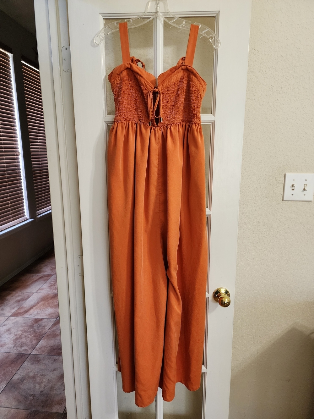 Free People Rust Tencel Wide Leg Jumpsuit Smocked Tie Strap Pockets M FLAW AS IS
